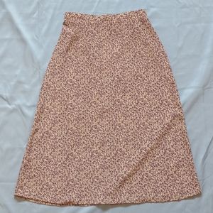 The perfect cottage core cream and purple floral print midi skirt